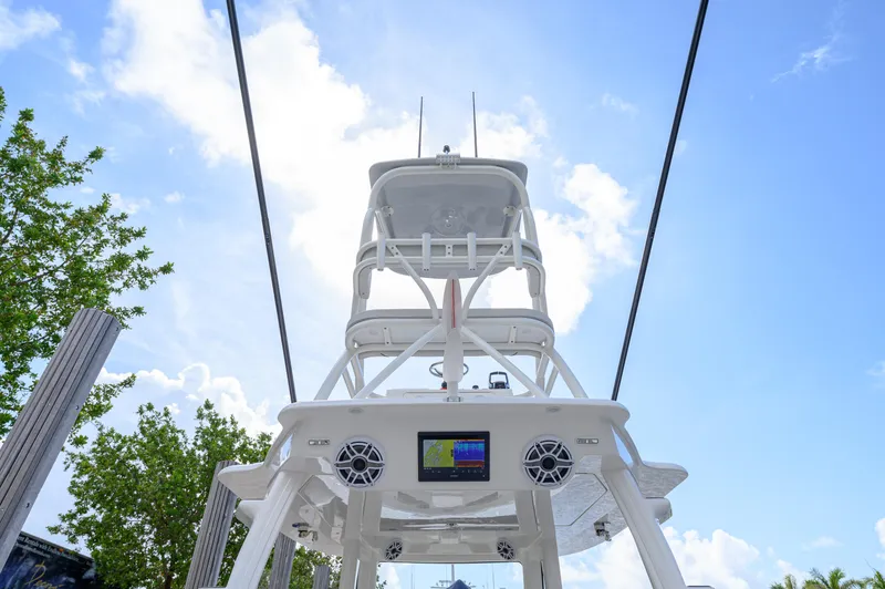 Slide: The Image of 2023 SeaVee 420Z boat tower against a bright blue sky. - 17