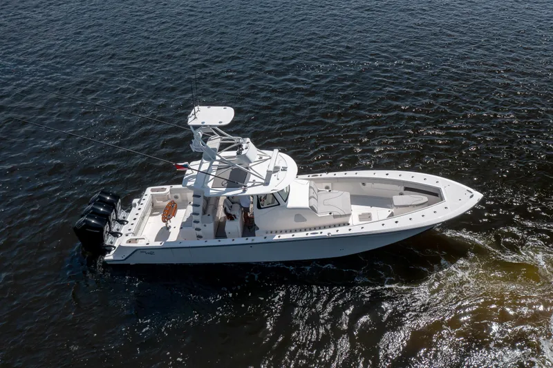 Slide: The Image of 2023 SeaVee 420Z boat cruising on open water. - 3