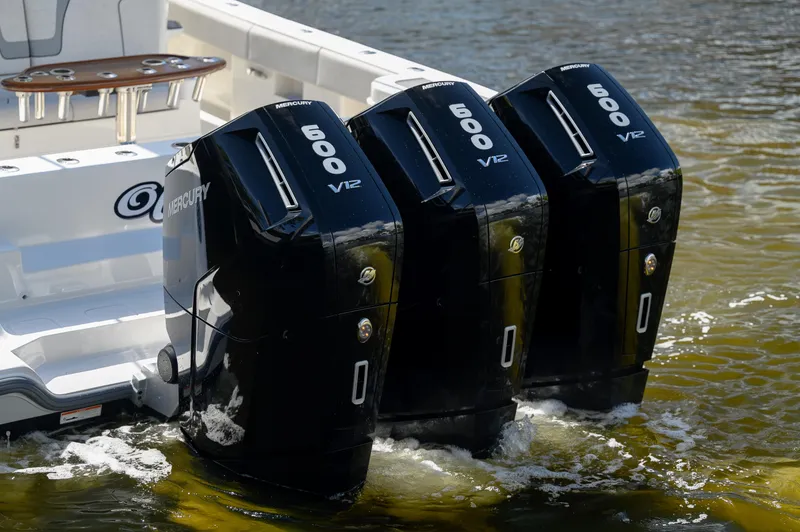 Slide: The Image of 2023 SeaVee 420Z with triple Mercury 600 V12 outboard engines on water. - 30