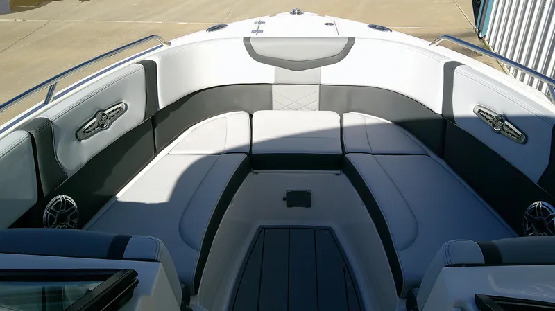 Slide: The Image of 2025 Chaparral 28 Surf boat interior with sleek seating and modern design. - 12