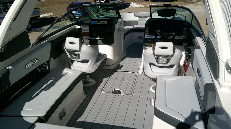 Slide: The Image of Interior of 2025 Chaparral 28 Surf boat with modern seating and sleek design. - 5