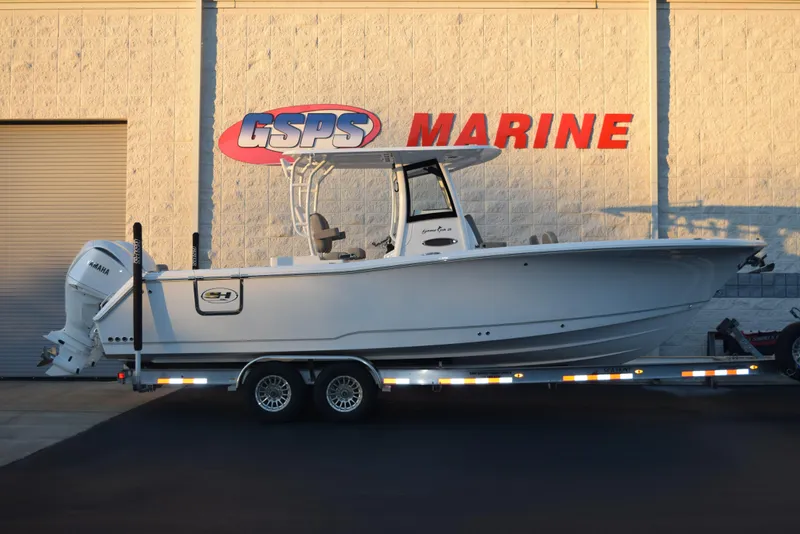 Slide: The Image of 2025 Sea Hunt Gamefish 28 boat on trailer at GSPS Marine dealership. - 1