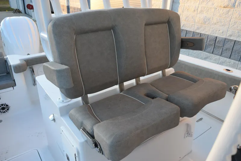 Slide: The Image of 2025 Sea Hunt Gamefish 28 boat seating, featuring comfortable gray cushions and armrests. - 11