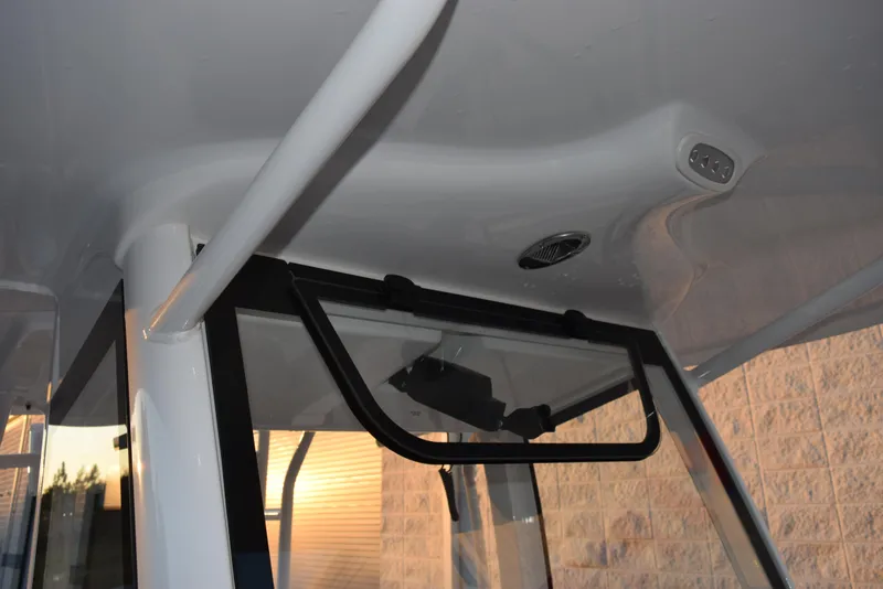 Slide: The Image of 2025 Sea Hunt Gamefish 28 boat interior with window and ceiling details. - 14