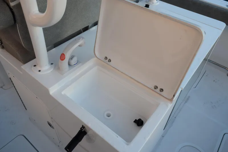 Slide: The Image of Open storage compartment on 2025 Sea Hunt Gamefish 28 boat. - 19