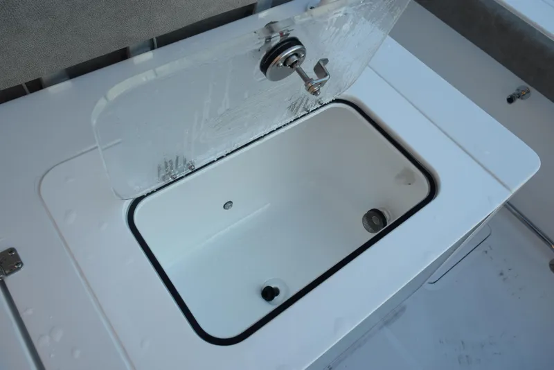Slide: The Image of Open storage compartment on 2025 Sea Hunt Gamefish 28 boat. - 21
