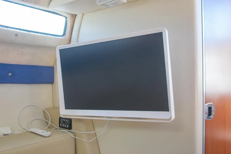 Slide: The Image of Flat screen TV inside 2010 Bayliner 2450 Ciera boat cabin. - 13