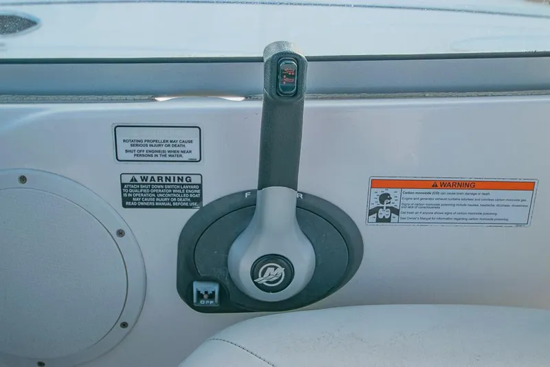 Slide: The Image of Throttle control panel on a 2010 Bayliner 2450 Ciera boat. - 28