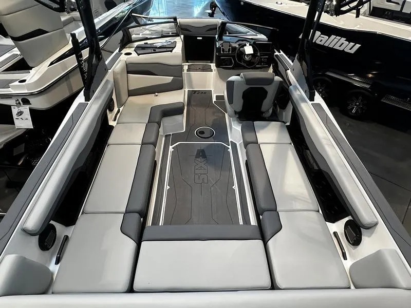 Slide: The Image of 2025 Axis T235 boat interior with spacious seating and modern design. - 3