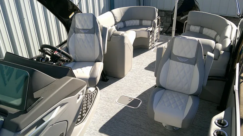 Slide: The Image of 2025 Bennington 25 QFB boat interior with luxurious seating and modern design. - 5