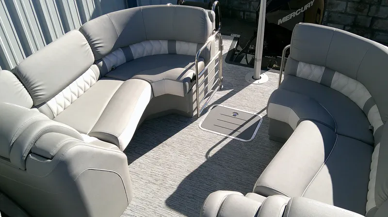 Slide: The Image of 2025 Bennington 25 QFB pontoon boat with luxurious seating and modern design. - 8