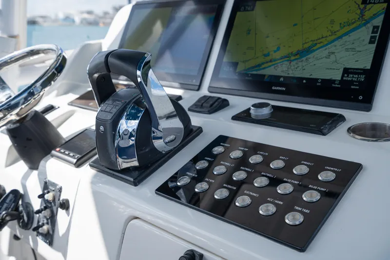 Slide: The Image of 2007 Intrepid 375 Center Console dashboard with navigation screens and controls. - 29