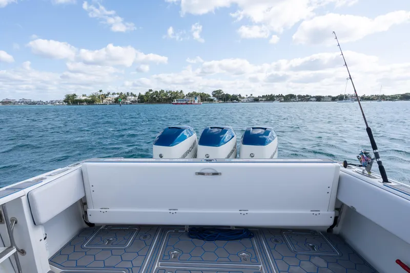 Slide: The Image of 2007 Intrepid 375 Center Console boat with triple engines on open water. - 35