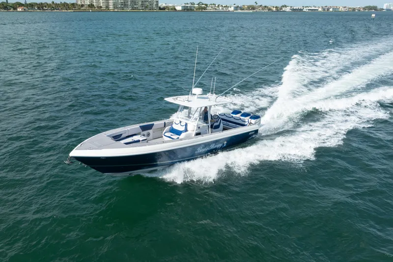 Slide: The Image of 2007 Intrepid 375 Center Console cruising on open water. - 6