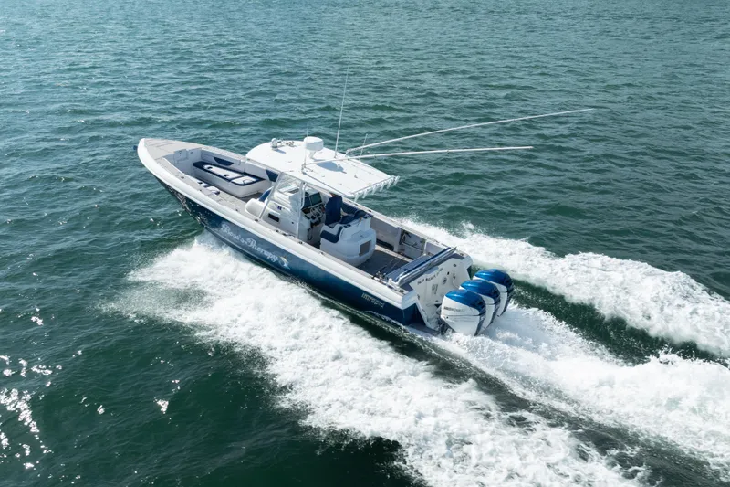 Slide: The Image of 2007 Intrepid 375 Center Console boat cruising on open water. - 7