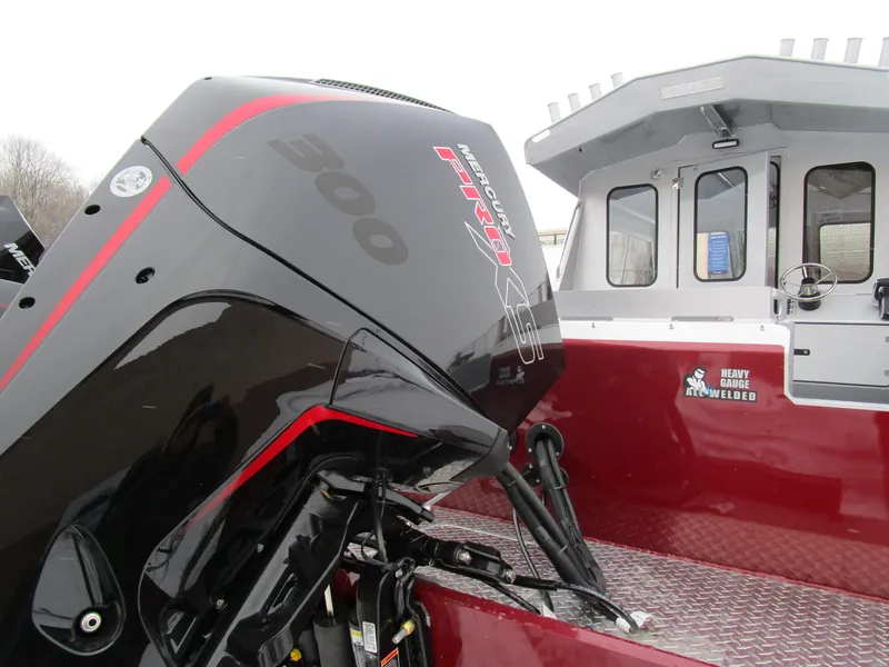 Slide: The Image of 2025 KingFisher 2425 Escape HT boat with powerful 300 horsepower engine, red and black design. - 28