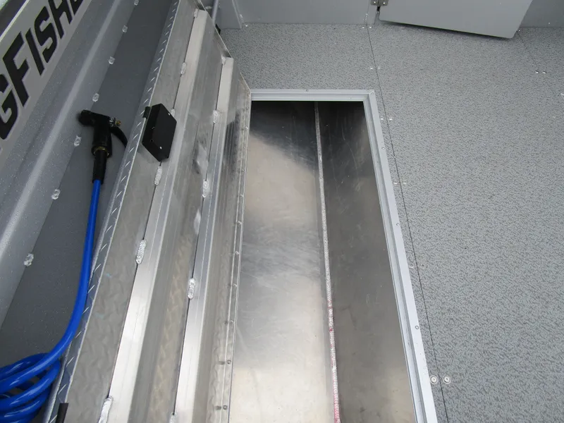 Slide: The Image of Storage compartment in 2025 KingFisher 2425 Escape HT boat interior. - 35