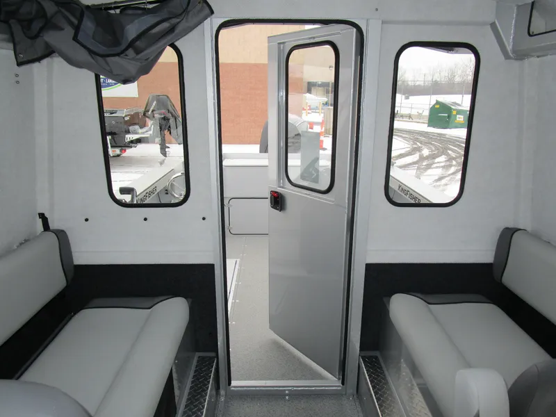 Slide: The Image of Interior of 2025 KingFisher 2425 Escape HT boat with seating and door. - 41
