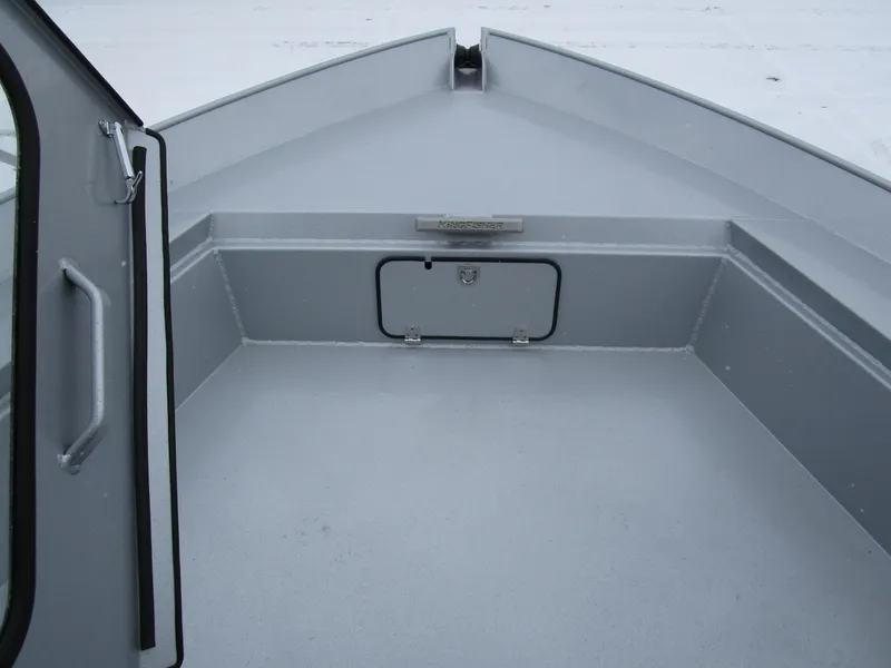 Slide: The Image of 2025 KingFisher 2425 Escape HT boat interior, showcasing spacious deck and storage compartment. - 46