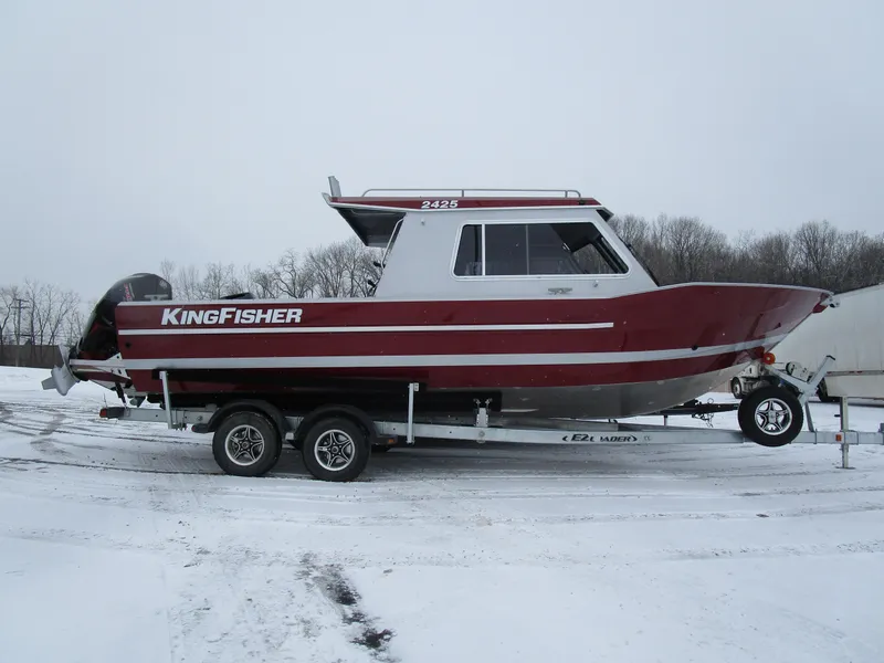 Slide: The Image of 2025 KingFisher 2425 Escape HT boat on trailer in snowy landscape. - 49