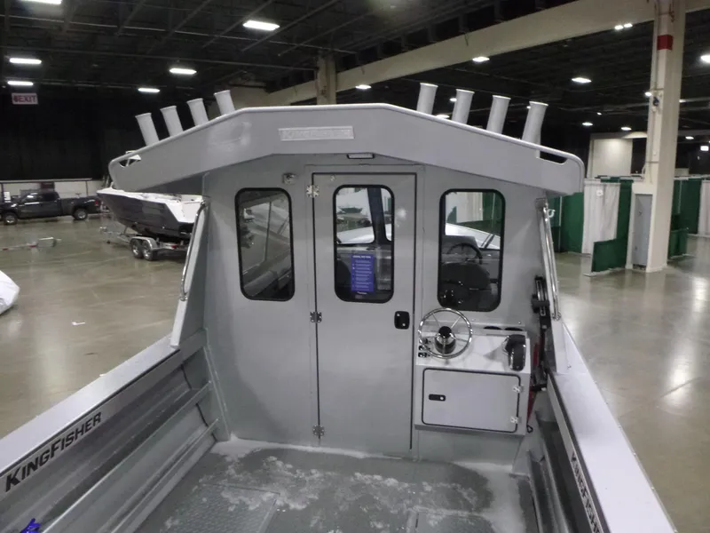 Slide: The Image of 2025 KingFisher 2425 Escape HT boat interior at an indoor exhibition. - 8