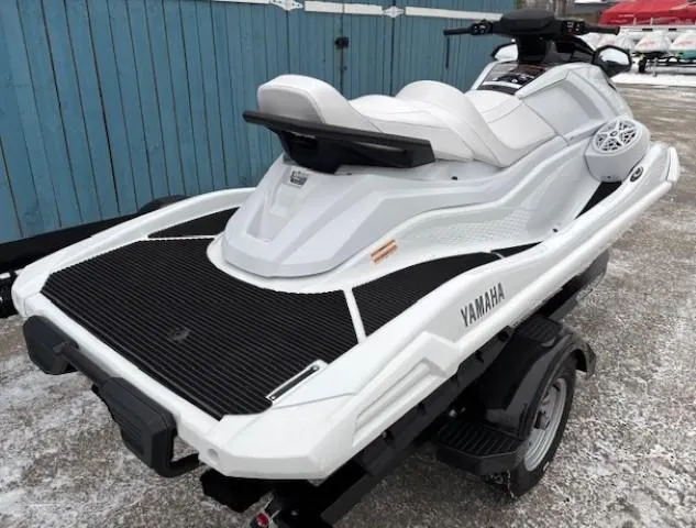 Slide: The Image of 2025 Yamaha WaveRunner VX Cruiser with Audio, white, on trailer, parked outdoors. - 3