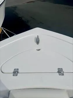 Slide: The Image of 2025 Tidewater 210 LXF boat bow with anchor storage compartment. - 10