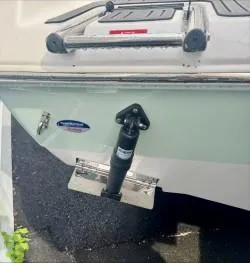 Slide: The Image of 2025 Tidewater 210 LXF boat stern with trim tab and stainless steel fittings. - 13