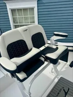 Slide: The Image of 2025 Tidewater 210 LXF boat seating with modern design and comfortable upholstery. - 5