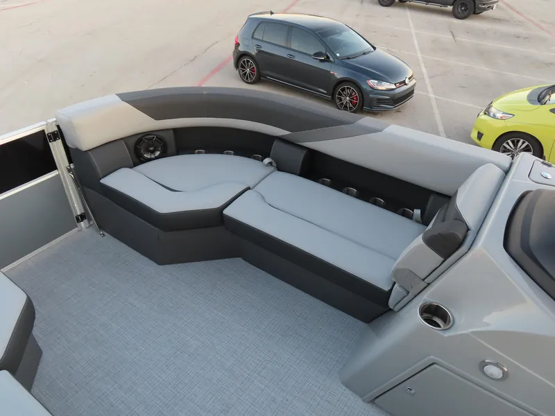 Slide: The Image of 2024 South Bay 224 RS 2.75 boat seat with logo, featuring gray and black upholstery. - 8