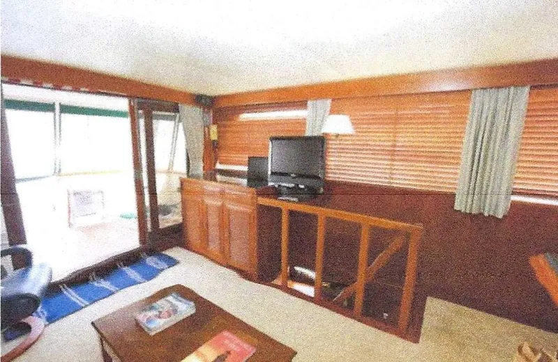 Slide: The Image of Interior of 1984 Ocean Alexander Flying Bridge Motor Yacht with TV and wooden furnishings. - 20
