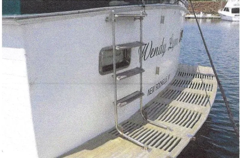 Slide: The Image of 1984 Ocean Alexander Flying Bridge Motor Yacht with ladder and swim platform. - 3