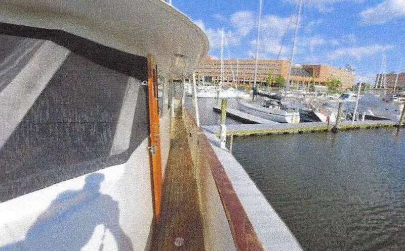 Slide: The Image of 1984 Ocean Alexander Flying Bridge Motor Yacht docked at marina, sunny day, clear sky. - 45