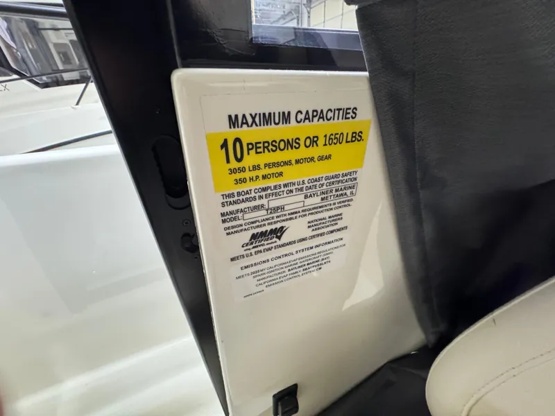 Slide: The Image of 2025 Trophy 25 Pilothouse capacity label, max 10 persons or 1650 lbs, 350 HP motor. - 10