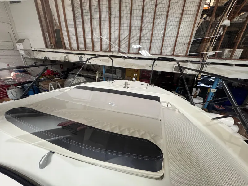 Slide: The Image of 2025 Trophy 25 Pilothouse boat interior in a storage facility. - 14