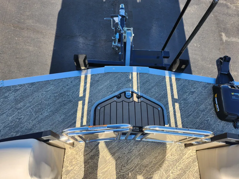 Slide: The Image of 2022 JC Neptoon 25 TT DSL boat deck with trailer hitch and ladder. - 24