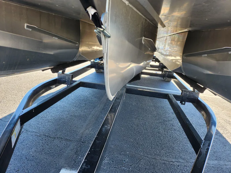 Slide: The Image of Underneath view of 2022 JC Neptoon 25 TT DSL pontoon boat on trailer. - 7