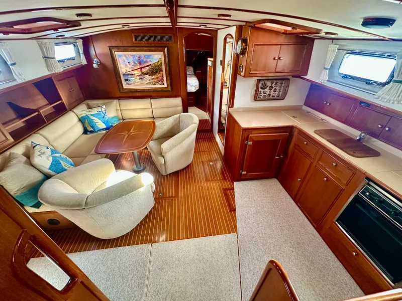 Slide: The Image of Luxurious interior of 2001 Grand Banks 49 Eastbay HX yacht with elegant wood finishes. - 15
