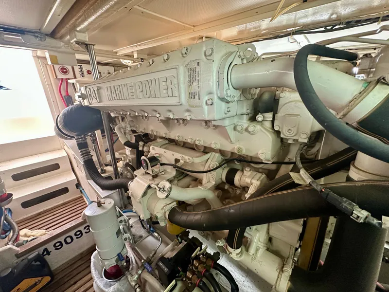 Slide: The Image of Engine room of 2001 Grand Banks 49 Eastbay HX with CAT Marine Power engine. - 43