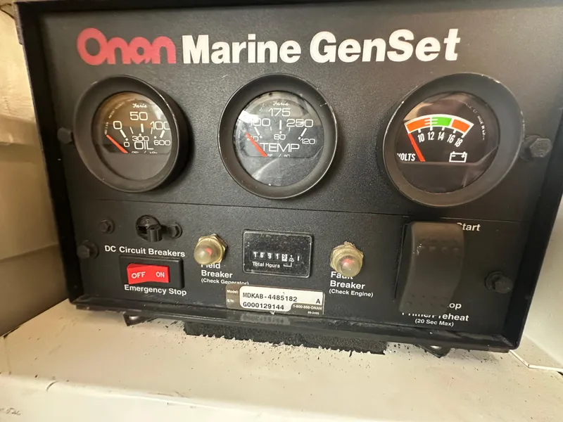 Slide: The Image of Onan Marine GenSet control panel on 2001 Grand Banks 49 Eastbay HX. - 45