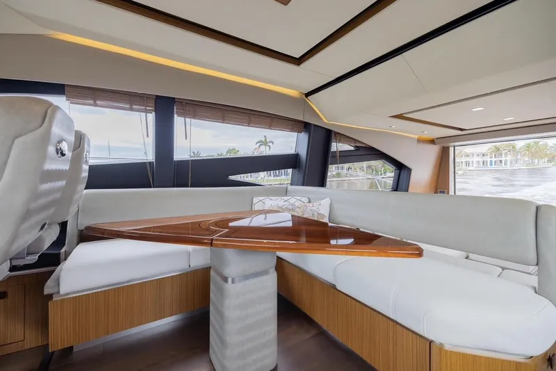 Slide: The Image of Luxurious interior of 2017 Sea Ray 59 Flybridge yacht with elegant seating and wooden table. - 19
