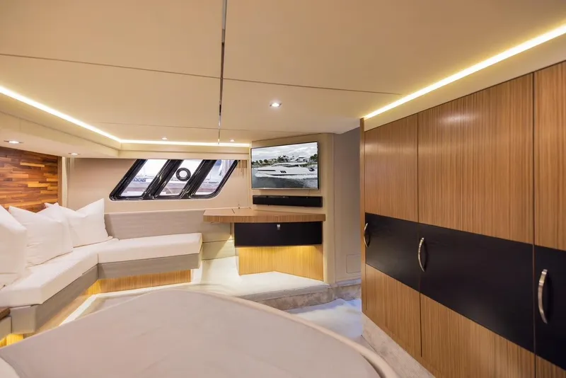 Slide: The Image of Luxurious interior of 2017 Sea Ray 59 Flybridge yacht with modern furnishings and ambient lighting. - 22
