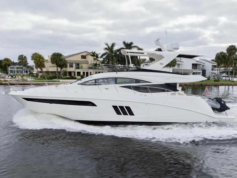 Slide: The Image of 2017 Sea Ray 59 Flybridge yacht cruising on a calm waterway. - 3