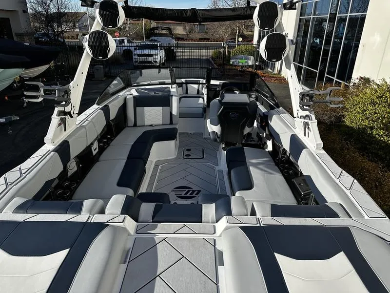 Slide: The Image of 2025 Malibu Wakesetter 23 LSV interior with spacious seating and modern design. - 3