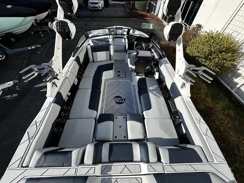 Slide: The Image of 2025 Malibu Wakesetter 23 LSV interior with sleek seating and modern design. - 5