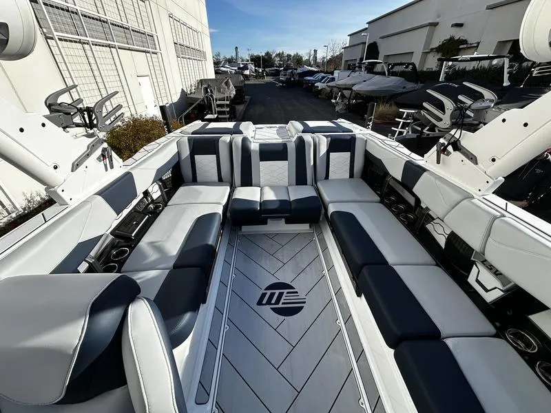 Slide: The Image of 2025 Malibu Wakesetter 23 LSV interior with spacious seating and modern design. - 6