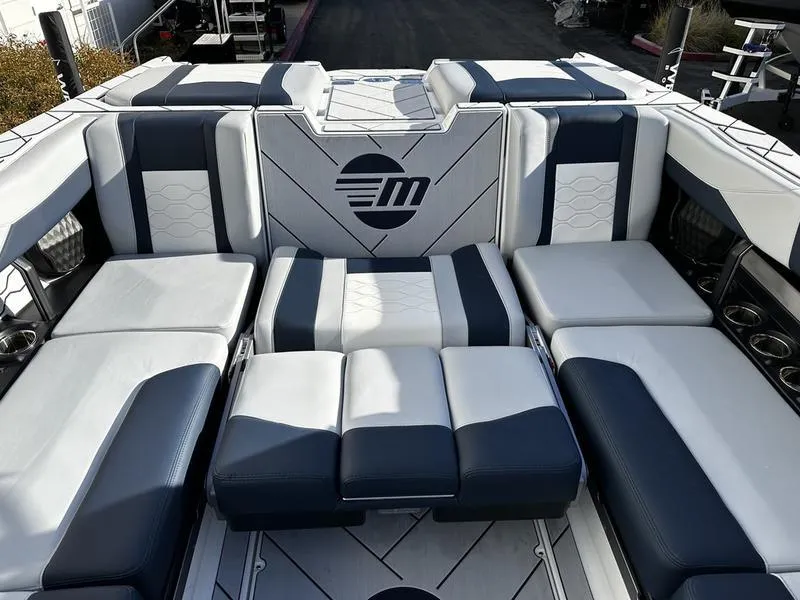 Slide: The Image of 2025 Malibu Wakesetter 23 LSV interior with luxurious seating and stylish design. - 7