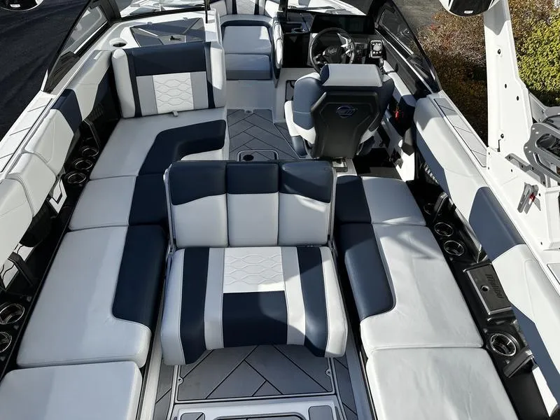 Slide: The Image of 2025 Malibu Wakesetter 23 LSV interior with luxurious seating and modern design. - 8