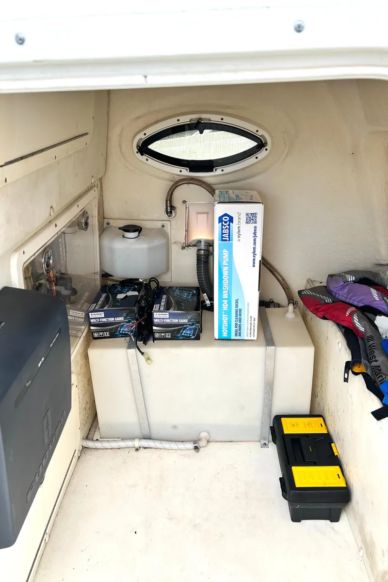 Slide: The Image of 2008 World Cat 330 TE interior with batteries and equipment storage. - 11