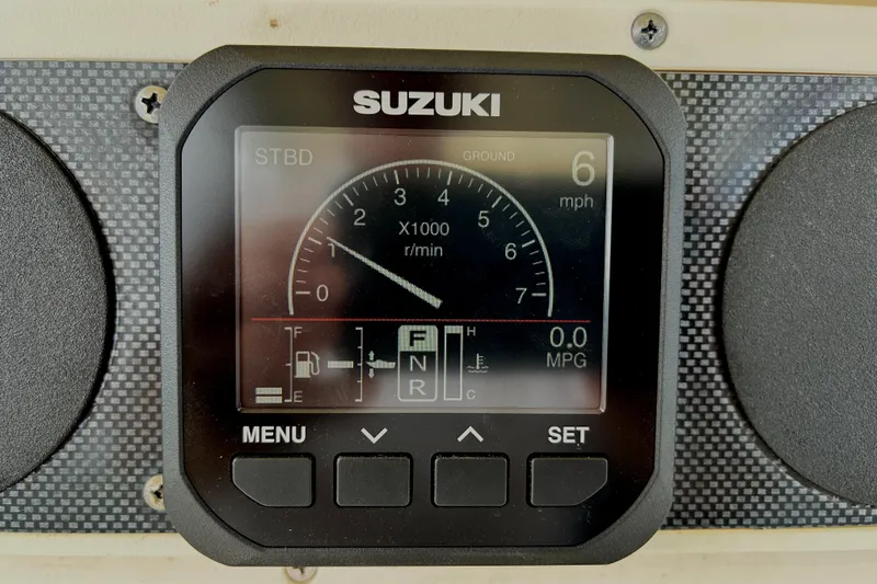 Slide: The Image of Suzuki digital gauge on 2008 World Cat 330 TE, displaying speed and RPM. - 21